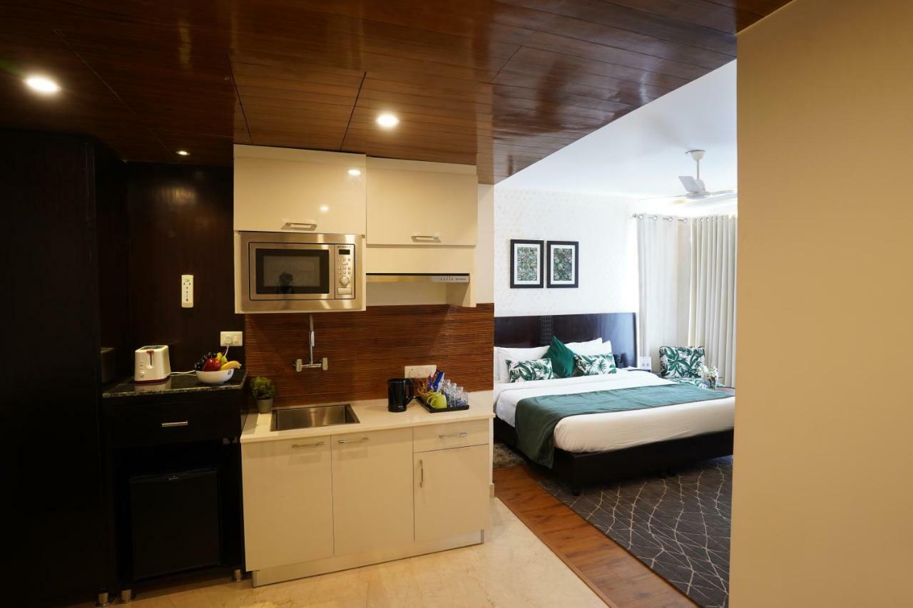 Rockland Hotel, C.R Park New Delhi Bagian luar foto