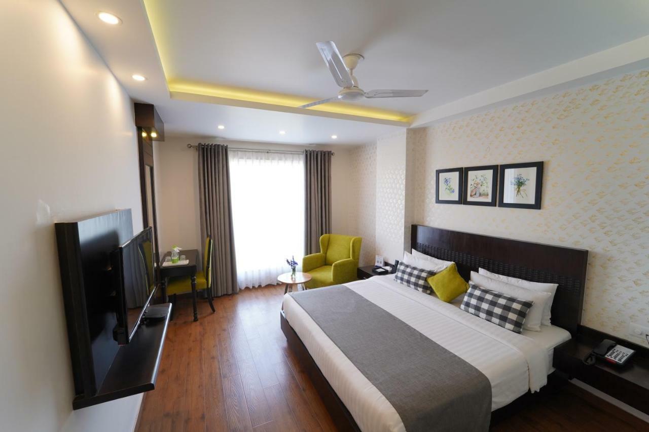 Rockland Hotel, C.R Park New Delhi Bagian luar foto